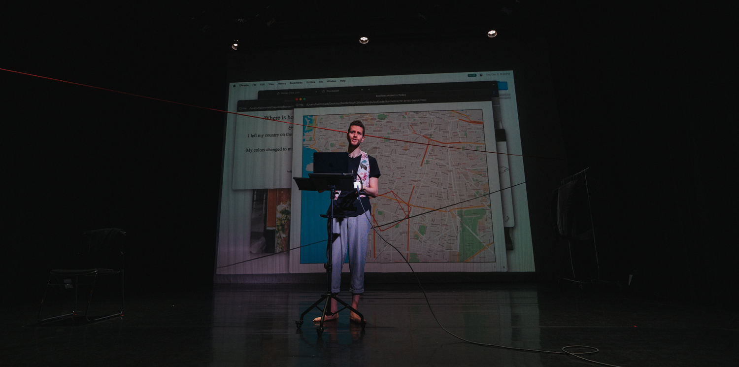 Projected red line imagery during the Borderline performance