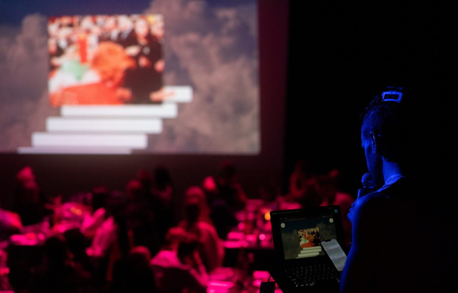 Stage setup with projected visuals of Beirut and San Francisco
