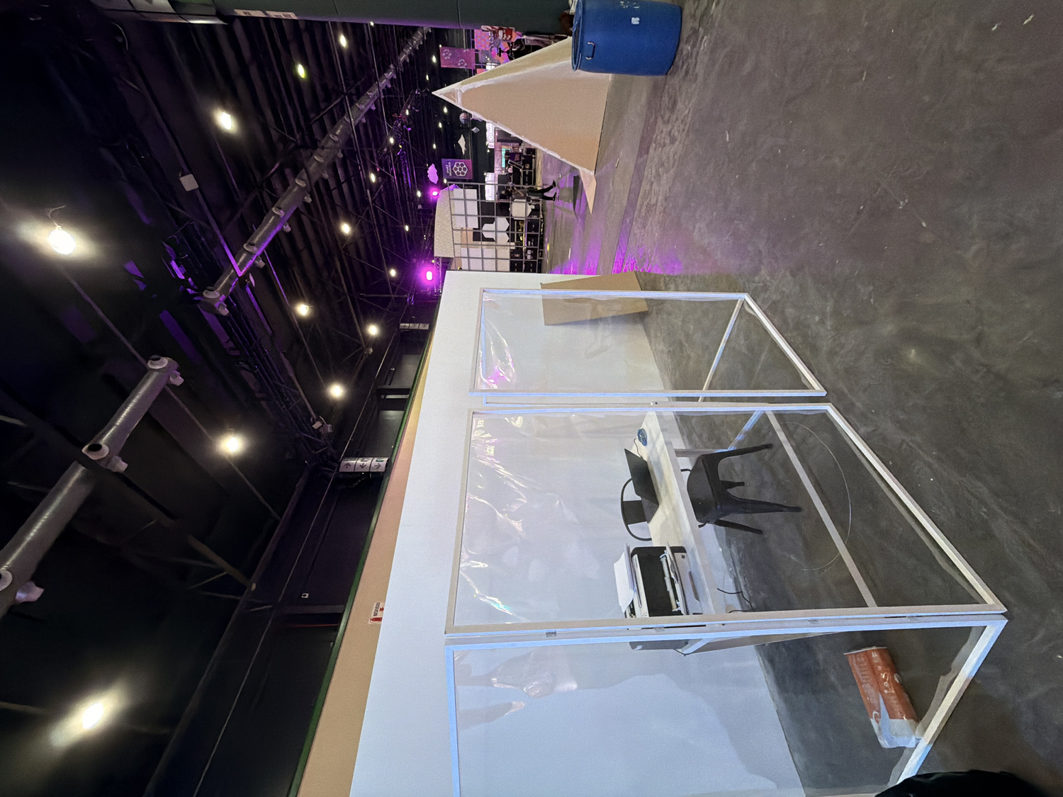 Close-up of printed poems with red and blue voting stickers