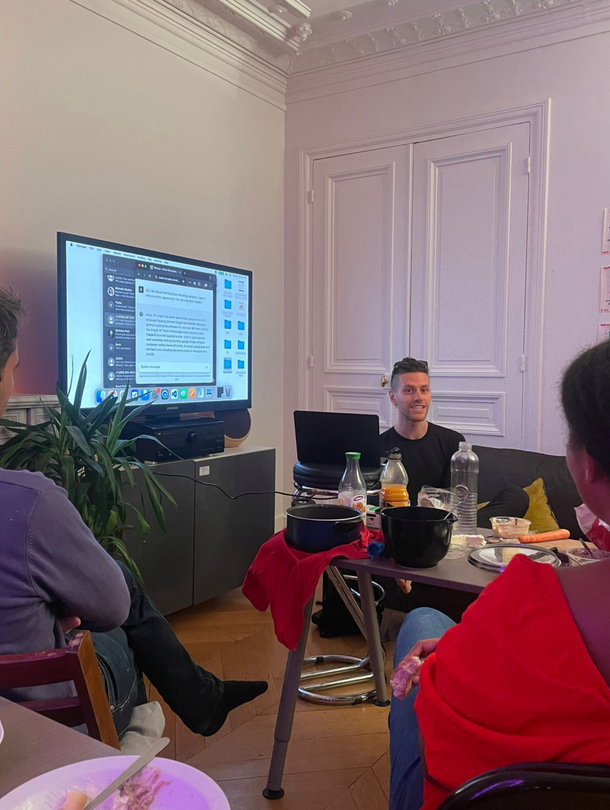 Collaborative web-building session with participants and screens
